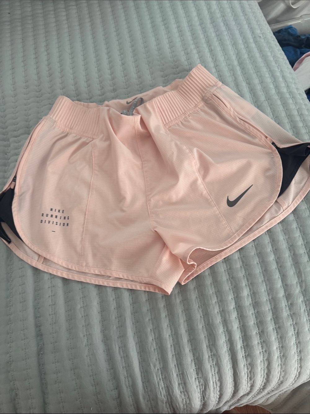 Nike Women's Light Pink Athletic Running Shorts with Black Trim